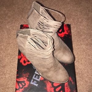 A tan pair of Fergalicious booties